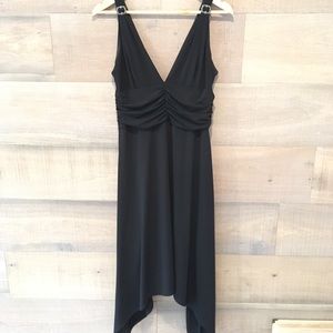 Woman’s black cocktail dress v-neck asymmetrical